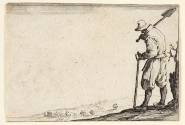 Boer met een spade op zijn schouder
