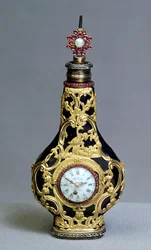 Geurfles met horloge en kompas