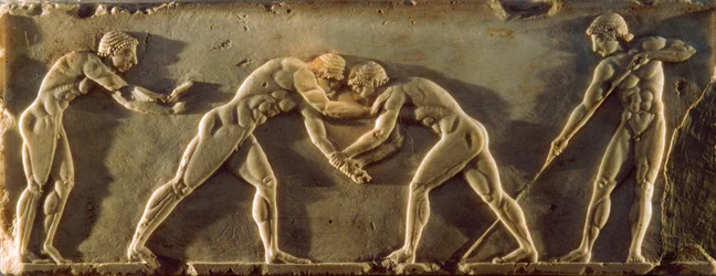 Oud-Griekse atleten afgebeeld op een bas-reliëf uit de 6e eeuw v.Chr. Nationaal Archeologisch...