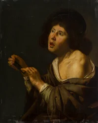 Portret van een jongen met een instrument