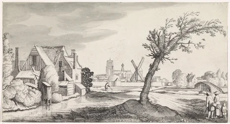 Familie bij een huis met een stad op de achtergrond