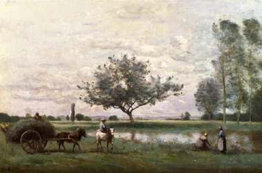 Hooikar naast een rivier