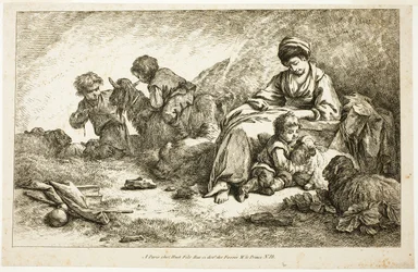Moeder en kinderen met schapen