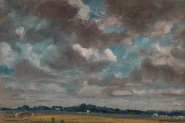 Uitgestrekt landschap met grijze wolken
