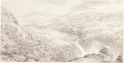 Een bergvallei met een waterval
