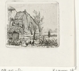 Kippen bij een boerenschuur