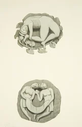 Twee gewelfstenen in het plafond bij de noorddeur van de Bristol Cathedral