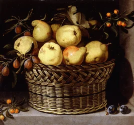 Een rieten mand met fruit op een stenen richel