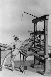 Jonge blinde mannen aan het werk bij een drukpers, illustratie uit 