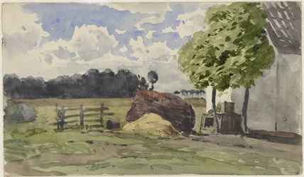 Stapel hout voor een boerderij in het weiland