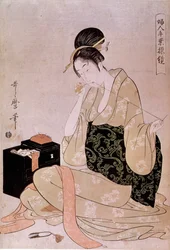 Naaien, serie over handwerk door vrouwen: een naaister knipt de draad met haar tanden af. Japanse prent van Utamaro Kitagawa (1753-1806). Afmetingen: 0,37x0,26 m. 18e eeuw. Parijs, Guimetmuseum, Nationaal Museum voor Aziatische Kunst
