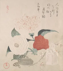 Camellia bloemen, een netsuke en een zegel