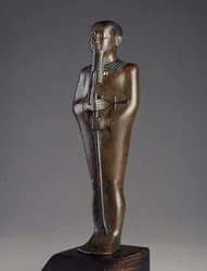 Beeldje van de god Ptah, brons met zwart pigment en ingelegd zilver en goud