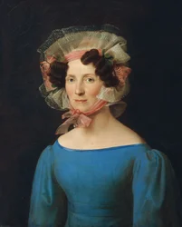 Dame in blauwe jurk