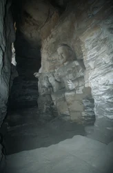 China, Shanxi provincie, zandstenen beeld van Boeddha in Yungang Grotten