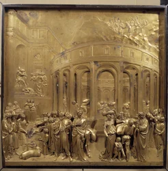 Geschiedenis van het leven van Jozef. De oogst van het graan: de boeren brengen de zakken graan. Origineel paneel van de deur van het Paradijs