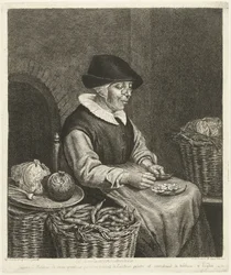 Oude vrouw bij het boontjes doppen