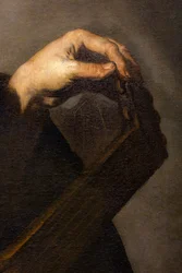 Muzikant stemt zijn luit (detail)