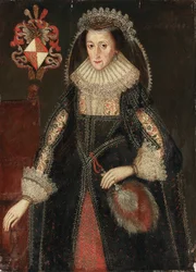 Portret van Lady Eleanor Dutton, driekwart lengte, in elegante jurk, staand naast een stoel met het wapen van de familie Dutton uit Cheshire en Gloucestershire