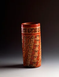 Polychrome cilindrische kleivaas. Uit Tikal