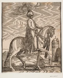 Ruiter met tulband, met knuppel aan de rechterkant van het paard; profiel naar rechts; aan de rechterkant van het beeld een muur met een poort en een ronde toren