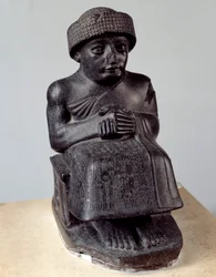 Mesopotamië: standbeeld van de god Ningishzida die Gudea voorstelt, prins van Lagash