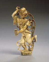 Een figuur van Kui xing