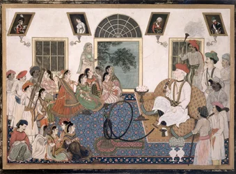 Een Europeaan, waarschijnlijk Sir David Ochterlony (1758-1825), in Indiase kleding, rookt een waterpijp en kijkt naar een nautch in zijn huis in Delhi, c.1820