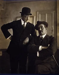 De componist Giacomo Puccini (1858-1924) en de muziekuitgever Tito Ricordi II (1865-1933).