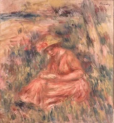 Vrouw zittend op het gras