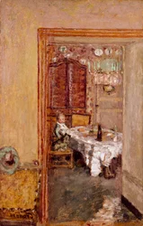 Kleine jongen in de eetkamer.