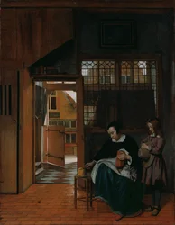 Een Vrouw Bereidt Brood en Boter voor een Jongen, ca. 1660