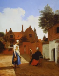 Binnenplaats in Delft in de avond: een spinnende vrouw