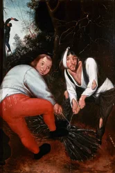 Twee boeren die takken binden