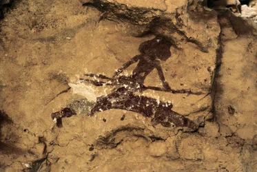 Rotstekeningen: vrouw jager. Prehistorie, Boven-Paleolithicum. Tio Garroso Grot, Spanje.