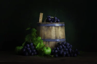 Oogstdruiven en vat