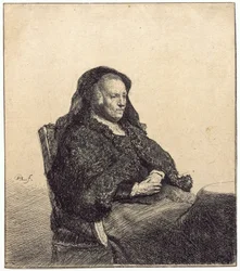 Een oudere vrouw (Rembrandts moeder, zittend aan een tafel)