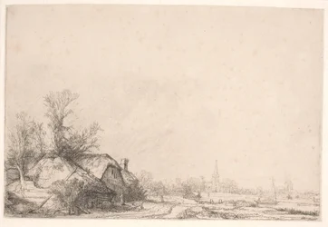 Vakantiehuisjes aan een kanaal: met een kerk en een zeilboot