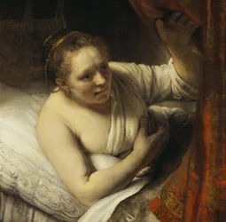 Een vrouw in bed