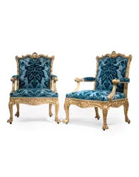Een paar George III vergulde houten armstoelen