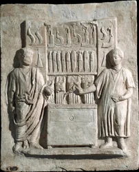 Romeinse kunst: laag reliëf van de grafsteen van Lucio Cornelio Atimeto, bestek. 1e eeuw n.Chr. Van Villa Massimo, Rome. Rome, Museo della Civilta Romana