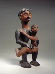 Zittende moeder en kind, Igbo, Nigeria (hout)