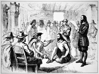 Massasoit, hoofd van de Wampanoag, biedt de vredespijp aan John Carver in 1621