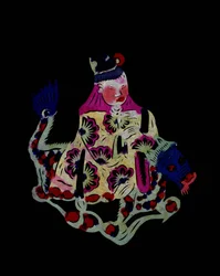 Chinese god op een draak. Geschilderd papierknipsel of "Jian Zhi", Chinese volkskunst, Pekin.