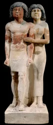 Egyptische oudheid: kalkstenen beeld van het echtpaar Raherka en Meresankh. 5e dynastie. Oude Rijk (omstreeks 2700-2200 v.Chr.). H. 0,52 x 0,21 m. Parijs, Musée du Louvre
