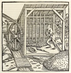 Mijnbouw met waterrad, uit de editie van 1550 van 