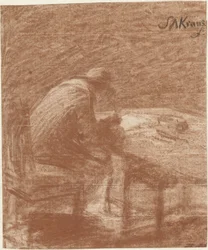 Schrijvende man aan een tafel