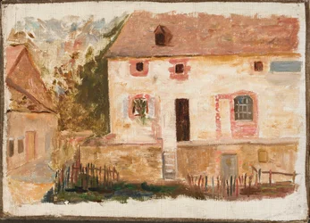 Huis met een lattenhek
