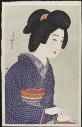 Vrouw zittend bij een vuurkorf, februari 1925