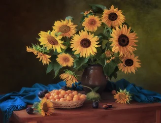 Herfstzonnebloemen en pruimen